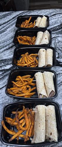 turkey and cheese wrap with homemade sauce and sweet potato fries