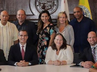 Toberman's new Executive Director, Darlene Kiyan with GRYD leader - Kenny Green & Los Angeles Mayor, Eric Garcetti.