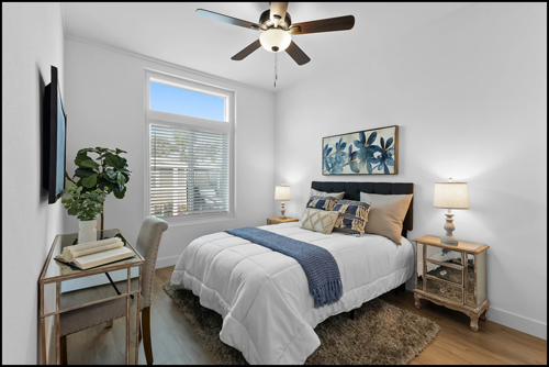 Gallery Image cozy-bedroom-blue-bedding-wooden-furniture.jpg