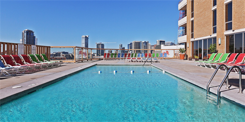 Sparkling Rooftop Pool with cabanas to relax or host your next extravaganza!