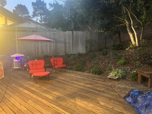 Newly refinished redwood deck with new landscaped backyard