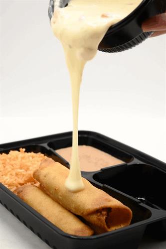 Gallery Image 6-13_Queso_Gif_on_Flautas.gif