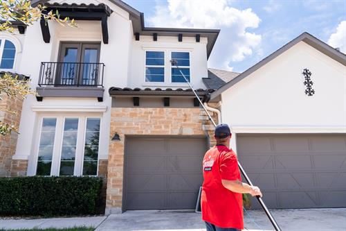 Ben making cleaning hard to reach windows look easy