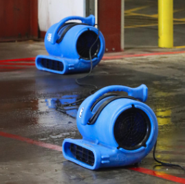 Industrial air movers deployed for structural drying after major water intrusion. Industrial air movers deployed for structural drying after major water intrusion.