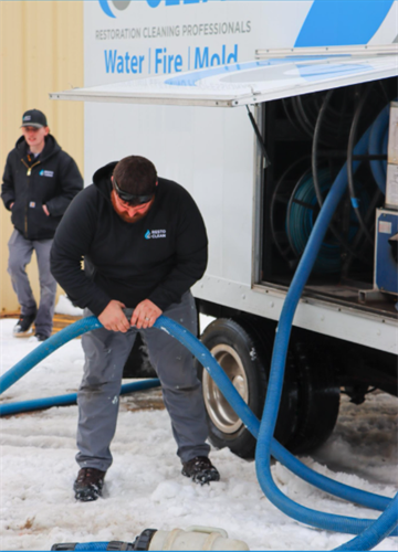 Our crew handling water extraction during an emergency flood cleanup — no job too big, no weather too tough. Our crew handling water extraction during an emergency flood cleanup — no job too big, no weather too tough.