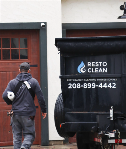 Resto Clean team securing property with dumpster and board-up service after disaster strikes. Resto Clean team securing property with dumpster and board-up service after disaster strikes.