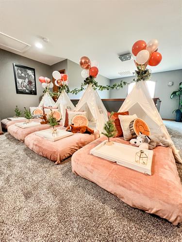 Blush Glamp sleepover party with balloon tent toppers