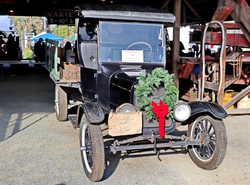 Model T is dressed up for Christmas on the Farm held first Sunday of December (not to be held 2023, but look forward to seeing you in 2024!)