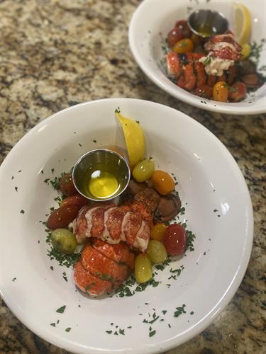 Butter poached lobster tail, basil tomatoes