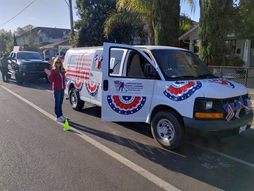 Owner Lora Wilcock with our spiffed up van all ready for the inaugural Brentwood Veterans Day Parade