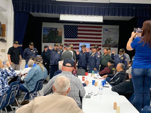 Members are sworn in as an official charter
