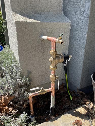 New water main service with new ball valves and pressure regulator 