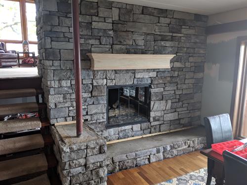 Stacked Stone Fire Place Wall & Mantel.
