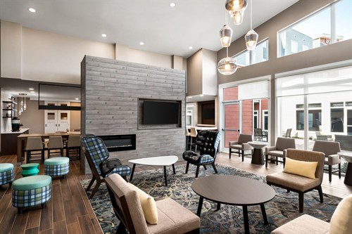 Welcoming lobby designed for comfort, productivity, and guest connection