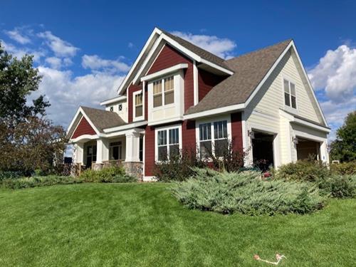 A beautiful home in Shakopee with red and cream paint