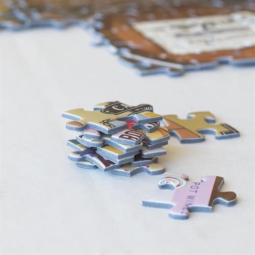 We manufacture high-quality puzzles by hand in a small workshop in the Eastlake neighborhood