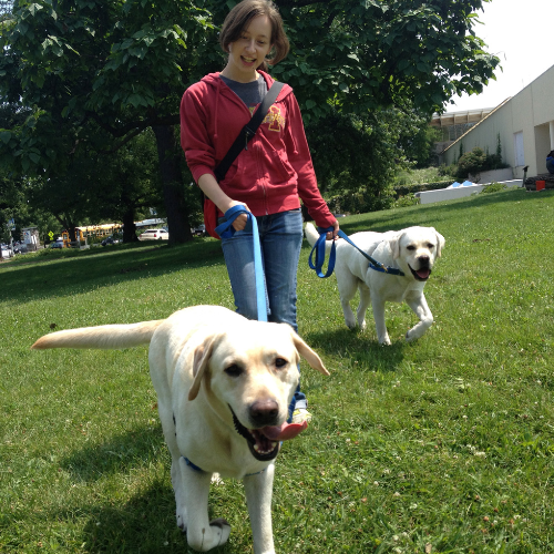 Ashlee with Burley and Ryder soaking in the sun in Lakeview