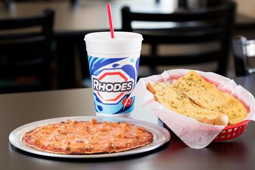Rhodes' Imo's Pizza franchises offer full menus of St. Louis-style favorites including pizza, sandwiches, pastas and salads.