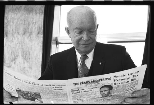 General Eisenhower reading the Stars and Stripes