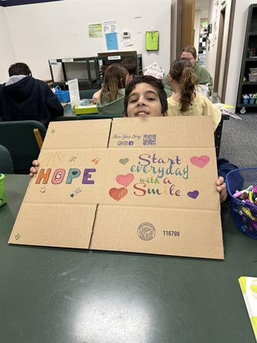 Gallery Image child_with_care_package_box.jpg