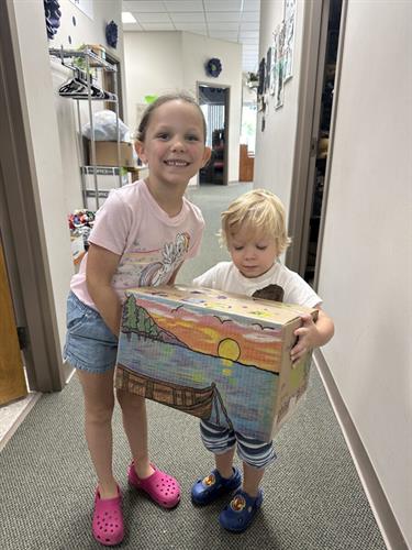 Gallery Image children_with_sunset_care_package.jpeg