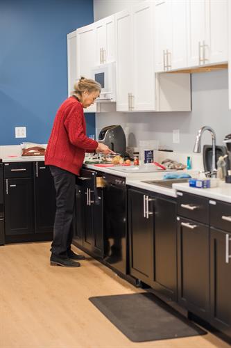 a full-time registered dietitian nutritionist helps select which food visitors receive and helps customize food for each household's dietary and cultural needs.