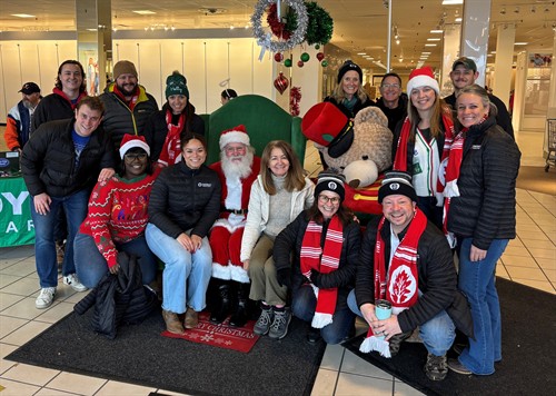 Our Charlottesville Office Team works together to collect, account for, and sort donations for the annual collection with Toy Lift Charities