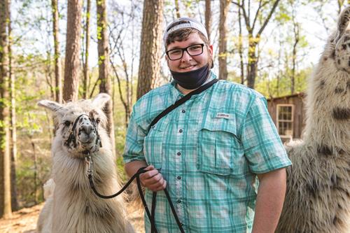 Gallery Image zach_with_an_alpaca.jpg