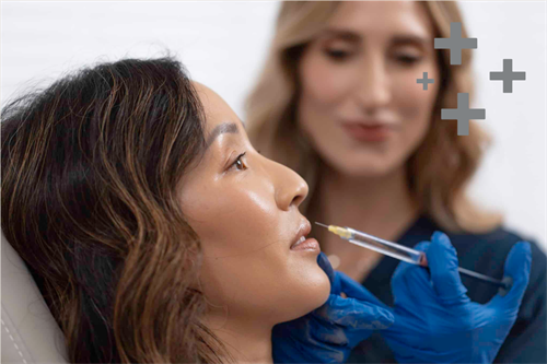 Dr. Ellis injecting a patient with Lip Filler