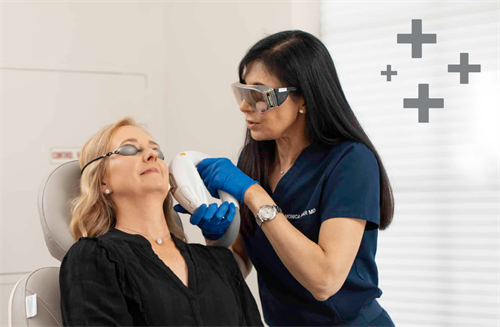 Provider treating a patient with Fotofacial 