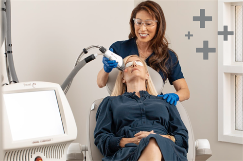 Provider performing a Laser Treatment on a patient