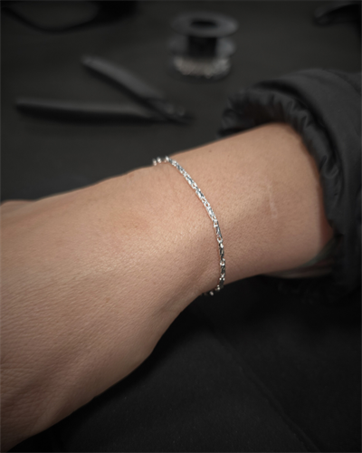 Gallery Image Permanent-Jewelry-Sterling-Silver-Diamond-Cut-Bar-Chain-Bracelet_(4x5).png