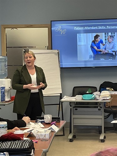 Steph, RWHC's Care Director, teaching a training session for caregivers