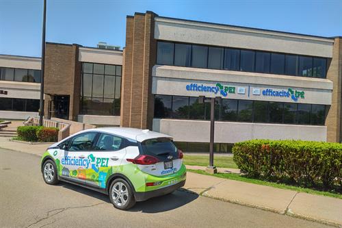 The electric vehicle parked outside of the efficiencyPEI Charlottetown office 