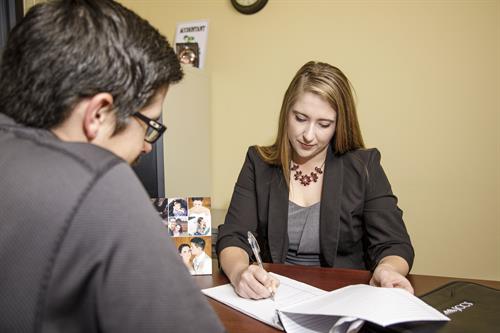 Tax Manager Katie Clouse helps a client in Whitefish. Tax Manager Katie Clouse helps a client in Whitefish.