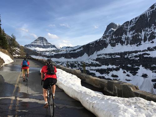 Biking the Going to the Sun Road in Glacier National Park is a May-June bucket list item!