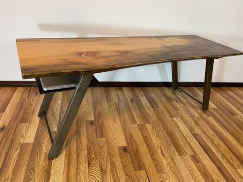 Beautiful and functional slab coffee table, seamlessly welded steel legs, floating steel shelf and steel bowtie to tie together a crack in the beautiful pine slab. 