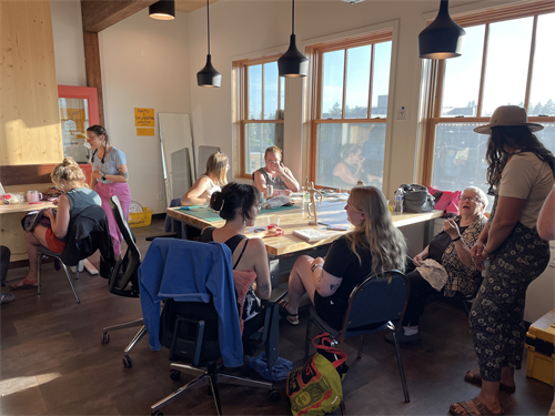 Community members crafting together in our workspace.