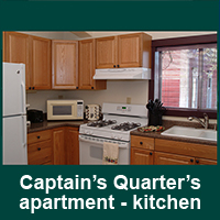 Gallery Image Captain's_Quarters_apartment_kitchen_view_1_chamber.jpg