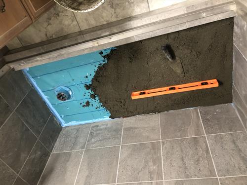 Slopping / Repair of Shower Basin