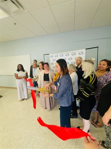 CCCS Staff welcome the community to their ribbon cutting at their new office space, located inside Habitat for Humanity of Kanawha & Putnam