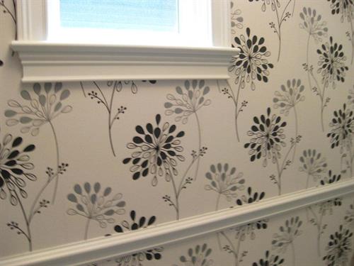 Wall papered one wall in an entry way Wall papered one wall in an entry way