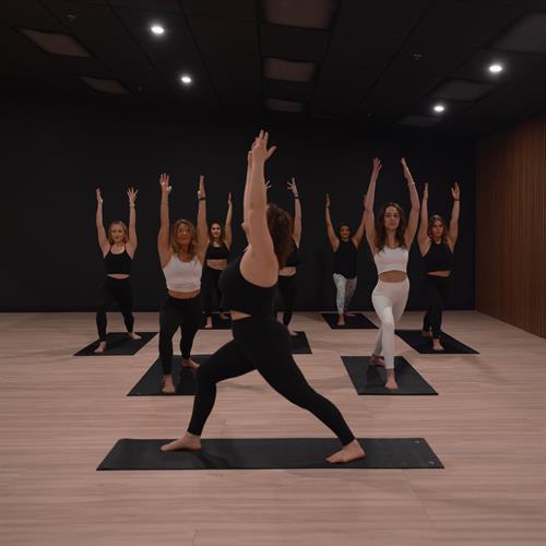 Group Hot Yoga + Fitness Classes