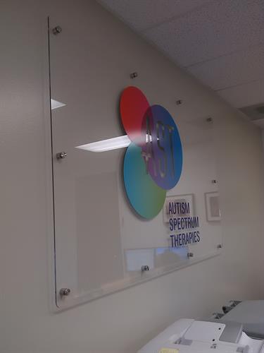 Autism Spectrum clear acrylic sign with logo