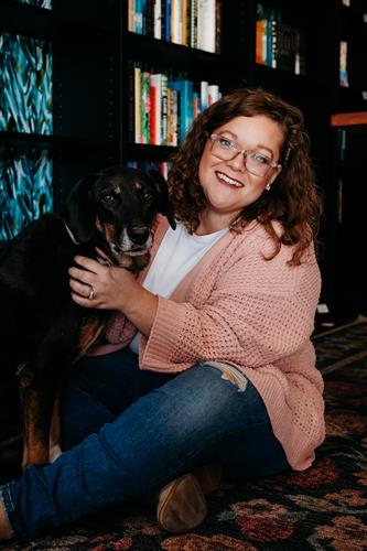 Taylor Hauk (owner) & Stella (bookstore dog!)
