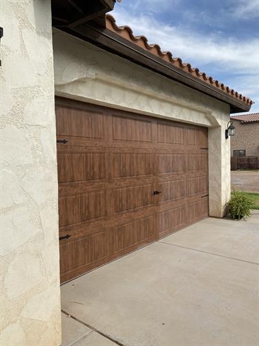 Garage Door Oxidation Removal, in this pic, side-by-side before and after oxidation removal. No need to repaint your garage doors