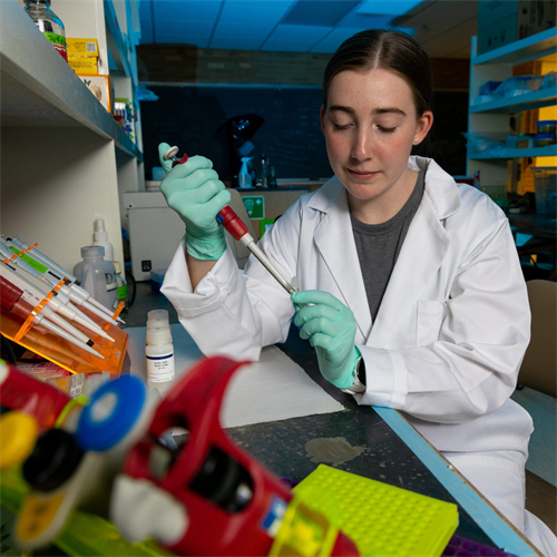 An EIU student works in a lab on campus