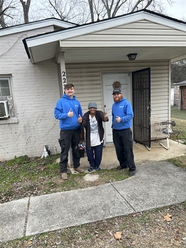 This is Luke, standing with a homeowner after a pro bono furnace install. Sometimes the job is bigger than the equipment.