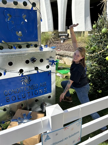 Shawna built this one. Our Tinsel Trail tree came together because she made it happen.