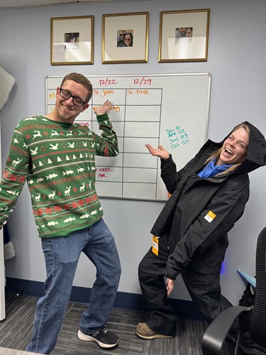 Shawna modeling this year’s company Christmas gifts. Practical, well-earned, and put to use immediately. Jeremy, our Assistant GM, is along for the photo.
